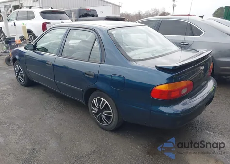 2001 Chevrolet Prizm from USA, damaged, VIN 1Y1SK52861Z441028